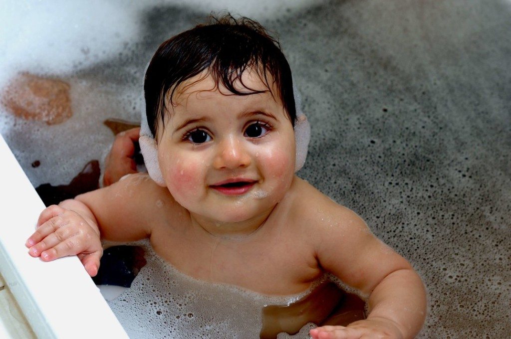 Baby taking bath