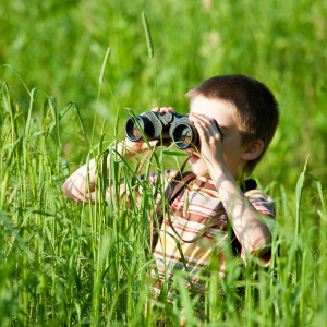 Kid with binocular
