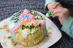 Kids-Cake-Decorating-adding-words-with-writer-icing