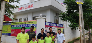 Sunrise Learning staff with kids